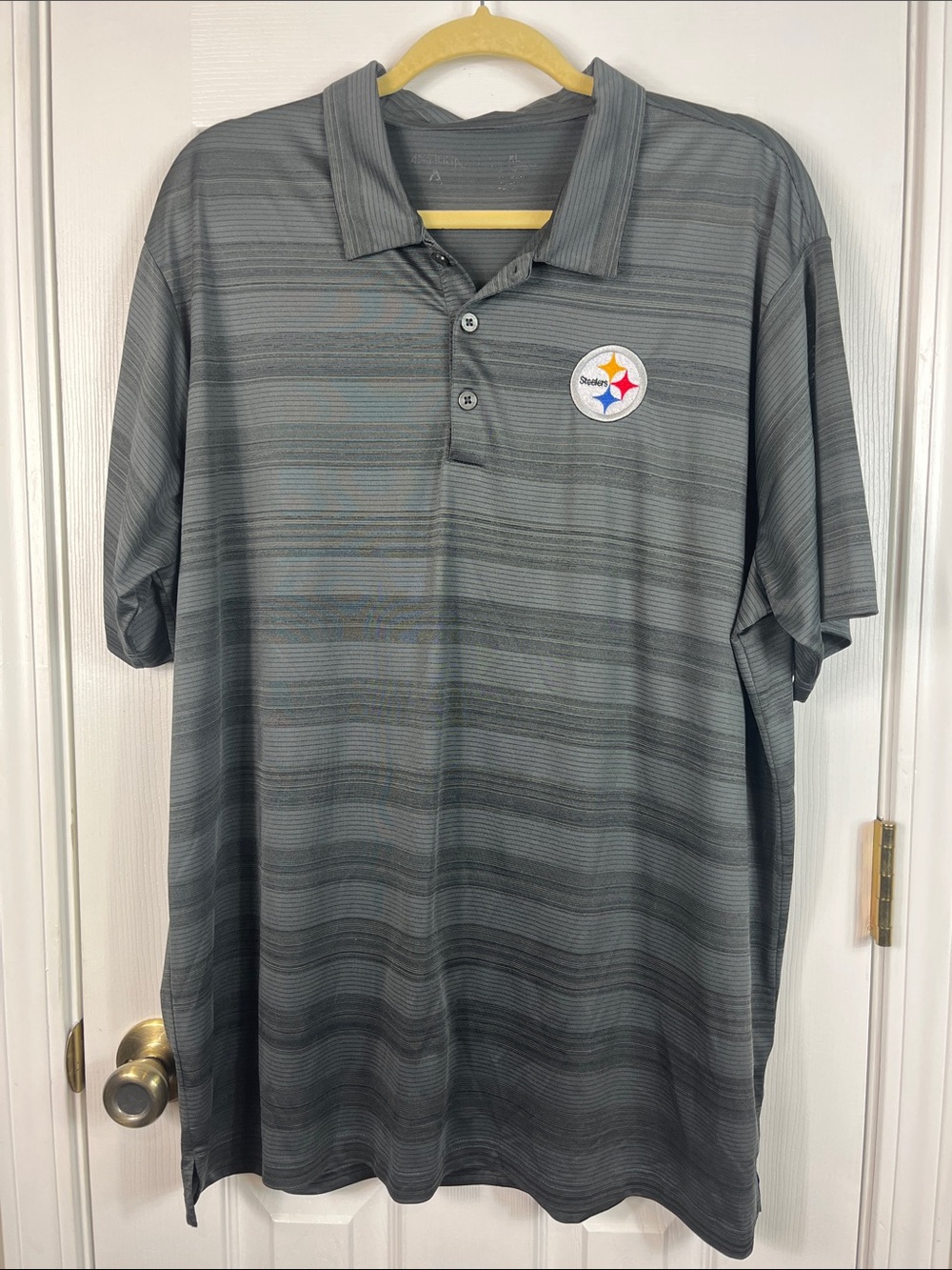 Antigua grey and black short sleeved Pittsburgh Steelers polo size XL.